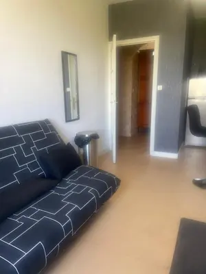 Coin salon dans l'établissement Maison en pierre