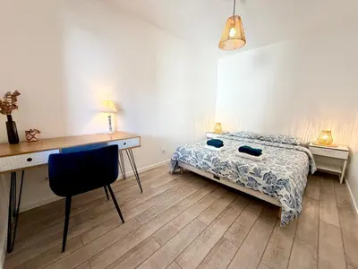 Un ou plusieurs lits dans un hébergement de l'établissement Escapade Océane aux portes de La Rochelle