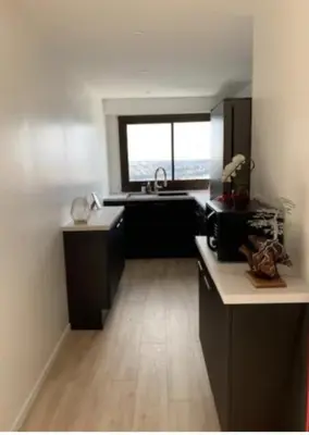 Cuisine ou kitchenette dans l'établissement Chambre dans un grand appartement refait - Belle vue