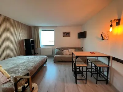 Un ou plusieurs lits dans un hébergement de l'établissement Studio 127 à 8 min à pied du Futuroscope 1 à 4 pers