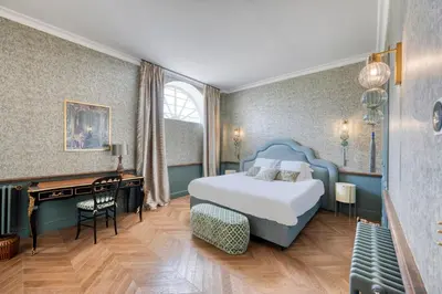 Un ou plusieurs lits dans un hébergement de l'établissement Château Optical Center