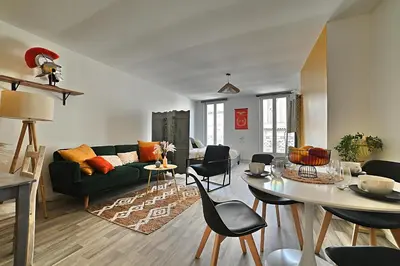 Coin salon dans l'établissement Ave César - Appartement Gallo-Romain en Hypercentre, Fibre, Tv 4K