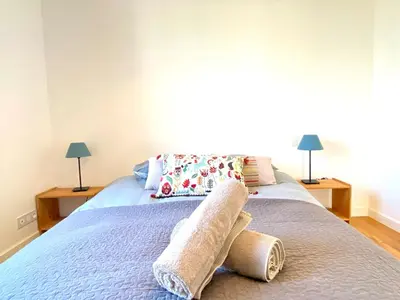 Un ou plusieurs lits dans un hébergement de l'établissement La Maison des Oiseaux