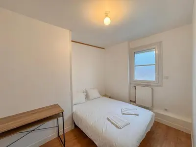 Un ou plusieurs lits dans un hébergement de l'établissement Appartement Neuf 4P - Terrasse - Parking