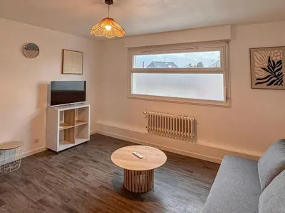 Télévision ou salle de divertissement dans l'établissement Appartement Neuf 4P - Terrasse - Parking