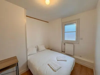 Un ou plusieurs lits dans un hébergement de l'établissement Appartement Neuf 4P - Terrasse - Parking
