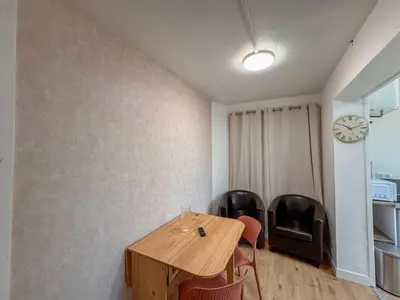 Coin salon dans l'établissement Studio Neuf Centre - Chambre Séparée - Parking