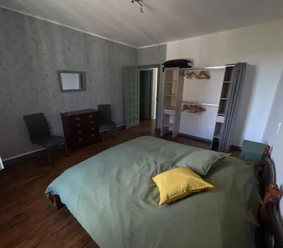Un ou plusieurs lits dans un hébergement de l'établissement Appartement pour 6 personnes au Vigeant
