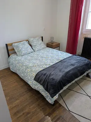 Un ou plusieurs lits dans un hébergement de l'établissement Townhouse in Poitiers Center
