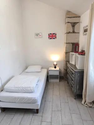 Un ou plusieurs lits dans un hébergement de l'établissement L'Escale Bleue charme au Marais Poitevin
