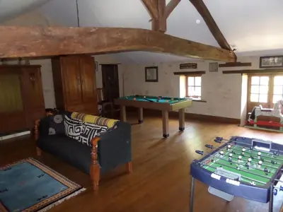 Salle de jeux dans l'établissement La Roseraie