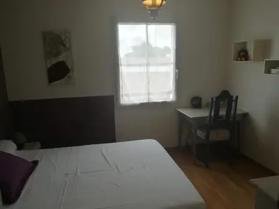 Un ou plusieurs lits dans un hébergement de l'établissement B&B La Difference