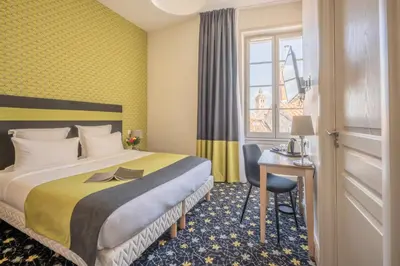 Un ou plusieurs lits dans un hébergement de l'établissement Hotel Heritage
