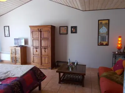Coin salon dans l'établissement Le Clos des Palmiers