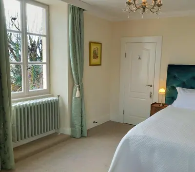 Un ou plusieurs lits dans un hébergement de l'établissement Chateau L'Orangerie