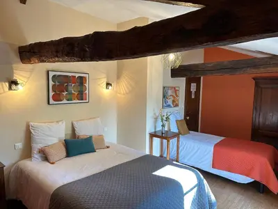 Un ou plusieurs lits dans un hébergement de l'établissement Chambres d'hôtes du puy d'anché