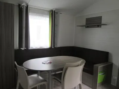 Coin salon dans l'établissement Camping Val de Boutonne
