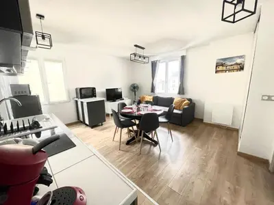 Coin salon dans l'établissement Appartement La Guignette