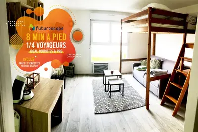 Un ou plusieurs lits dans un hébergement de l'établissement Futurostudio - Appart Hôtel Futuroscope - Poitiers