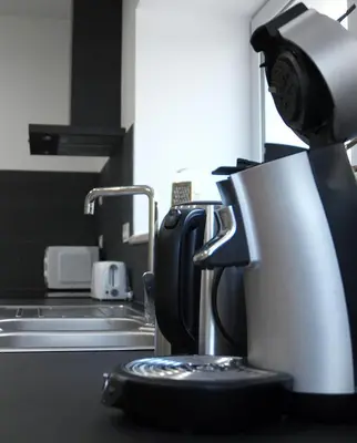 Cuisine ou kitchenette dans l'établissement Gîtes Les Demeures de Valette