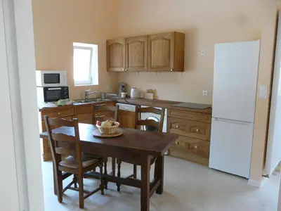 Cuisine ou kitchenette dans l'établissement Gîte Des Vergnes