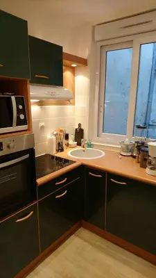 Cuisine ou kitchenette dans l'établissement Sur Le Vieux Port Appartement Vue Sur Mer