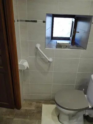 Salle de bains dans l'établissement Les Rosiers