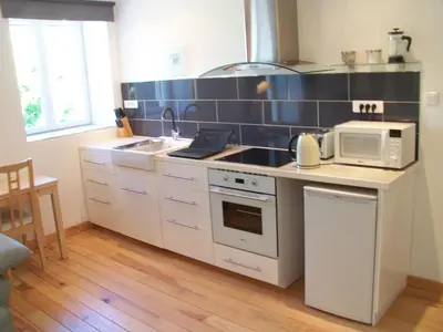 Cuisine ou kitchenette dans l'établissement Le Rosier