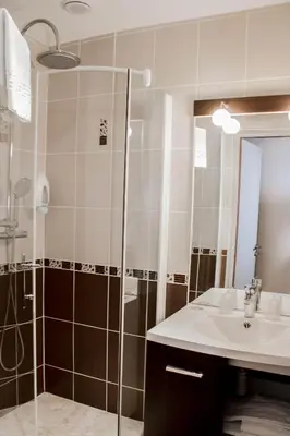 Salle de bains dans l'établissement Cit'Hotel Europeen