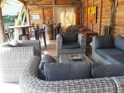 Coin salon dans l'établissement Le Relais du Haras