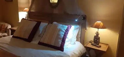 Un ou plusieurs lits dans un hébergement de l'établissement Le Relais du Haras