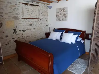 Un ou plusieurs lits dans un hébergement de l'établissement La charentaise ch d'hôtes ,Studio