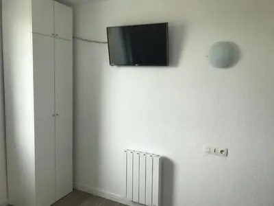 Télévision ou salle de divertissement dans l'établissement Appartement Futuroscope-P'