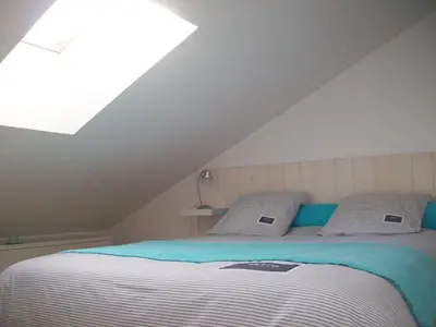 Un ou plusieurs lits dans un hébergement de l'établissement Appartements Les remparts d'Alienor