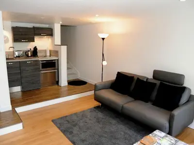 Cuisine ou kitchenette dans l'établissement Face au Jardin