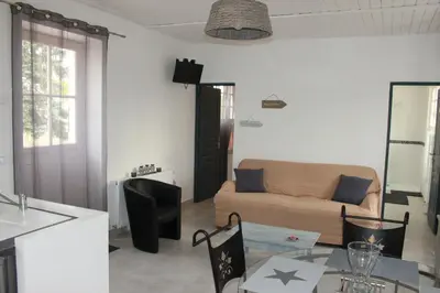 Coin salon dans l'établissement Charmante maison charentaise 