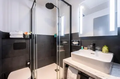 Salle de bains dans l'établissement Le Champlain