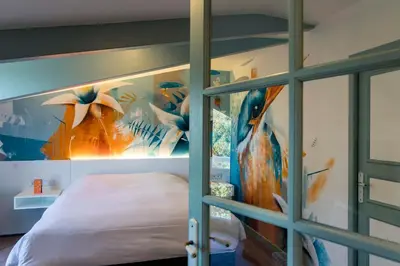 Un ou plusieurs lits dans un hébergement de l'établissement Hôtel L'Yeuse - Teritoria