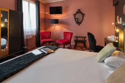Un ou plusieurs lits dans un hébergement de l'établissement The Originals Boutique, Hôtel Victoria, Châtelaillon-Plage