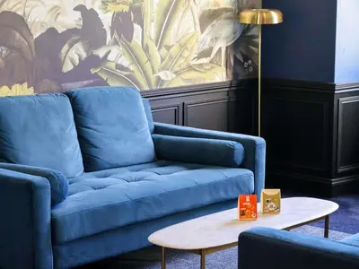 Coin salon dans l'établissement Hôtel Mercure Rochefort La Corderie Royale