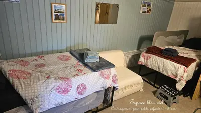 Un ou plusieurs lits dans un hébergement de l'établissement Chambre d'Hôtes le Gachignard