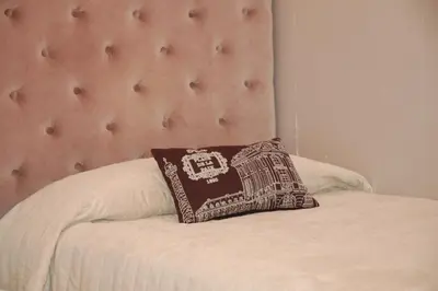 Un ou plusieurs lits dans un hébergement de l'établissement Hôtel de L'Avenue