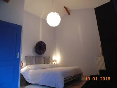 Un ou plusieurs lits dans un hébergement de l'établissement Gite Le Clos Constance
