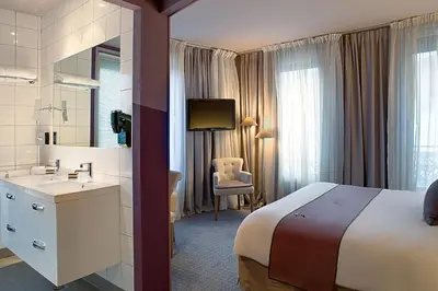 Un ou plusieurs lits dans un hébergement de l'établissement Best Western Hotel de la Breche