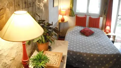 Un ou plusieurs lits dans un hébergement de l'établissement La Maison Rouge