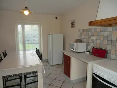 Cuisine ou kitchenette dans l'établissement Le Refuge