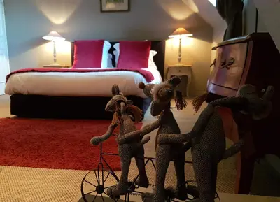 Un ou plusieurs lits dans un hébergement de l'établissement Chambres d'Hôtes Maison La Porte Rouge