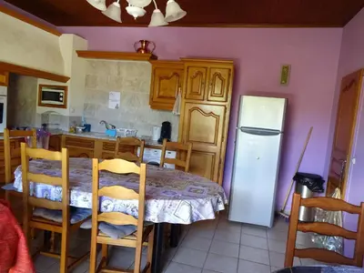 Cuisine ou kitchenette dans l'établissement Aux Orangers