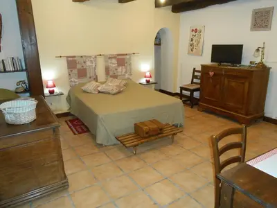 Un ou plusieurs lits dans un hébergement de l'établissement Chambre d'hotes Le Fourniou