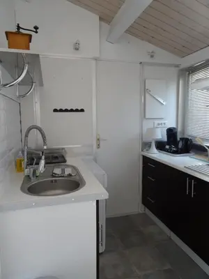 Cuisine ou kitchenette dans l'établissement Gîtes, Chambres d'Hôtes La Maison d'Amis